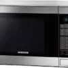 مایکروفر سامسونگ 34 لیتر SAMSUNG MICROWAVE MG34F602 1443352604levant MG34F602MAT SG 012 Right 15 top angle silver